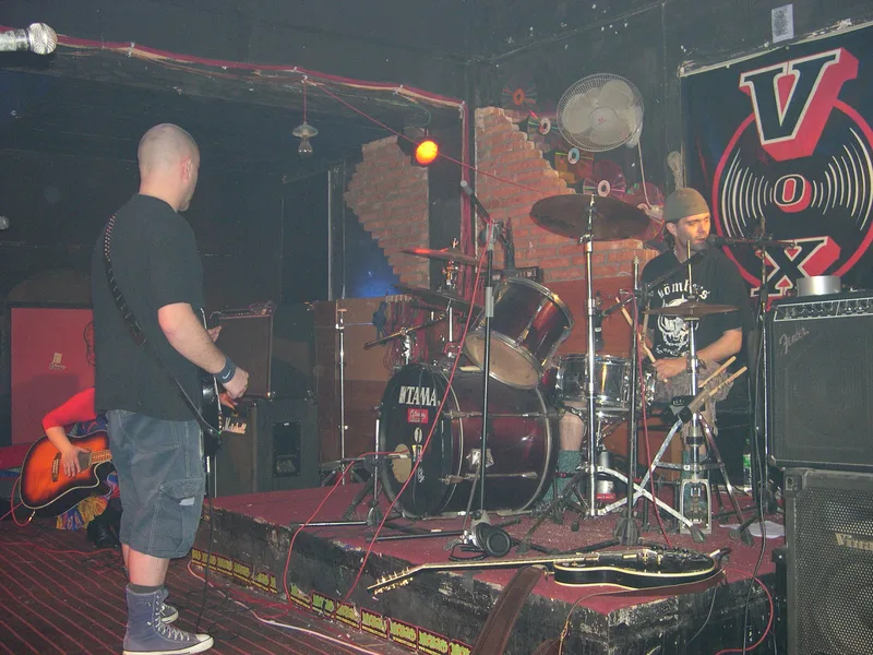 JEF on the VOX stage under the V banner, Katy on bass, Pez on drums and Kjell at the microphone