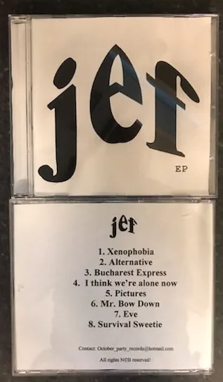 JEF Gratis promo cd som ble gitt ut i 460 eksemplarer og delt ut gratis 08.02.2002, alt CD brent og klippet ut for hånd hjemme av oss selv..jpg