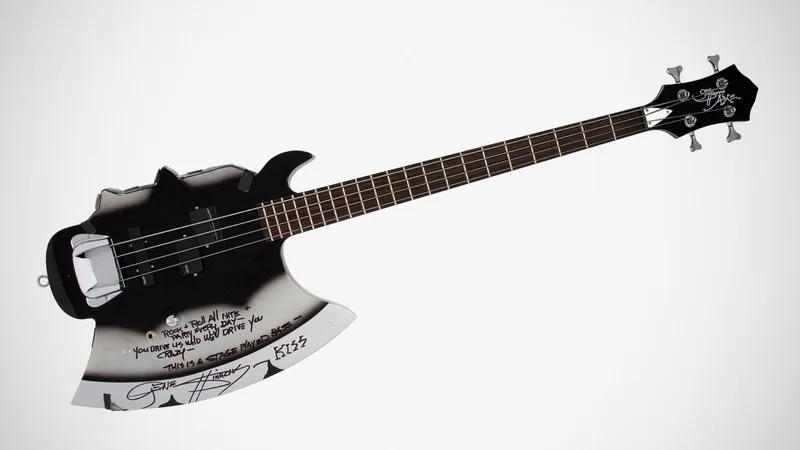 KISS-Gene-Simmons-Custom-Axe-Bass-Guitar-Featured-image-1568x882.jpg